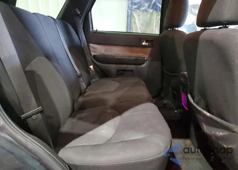 2009 Mercury Mariner z USA, uszkodzony, nr VIN 4M2CU81G69KJ19310